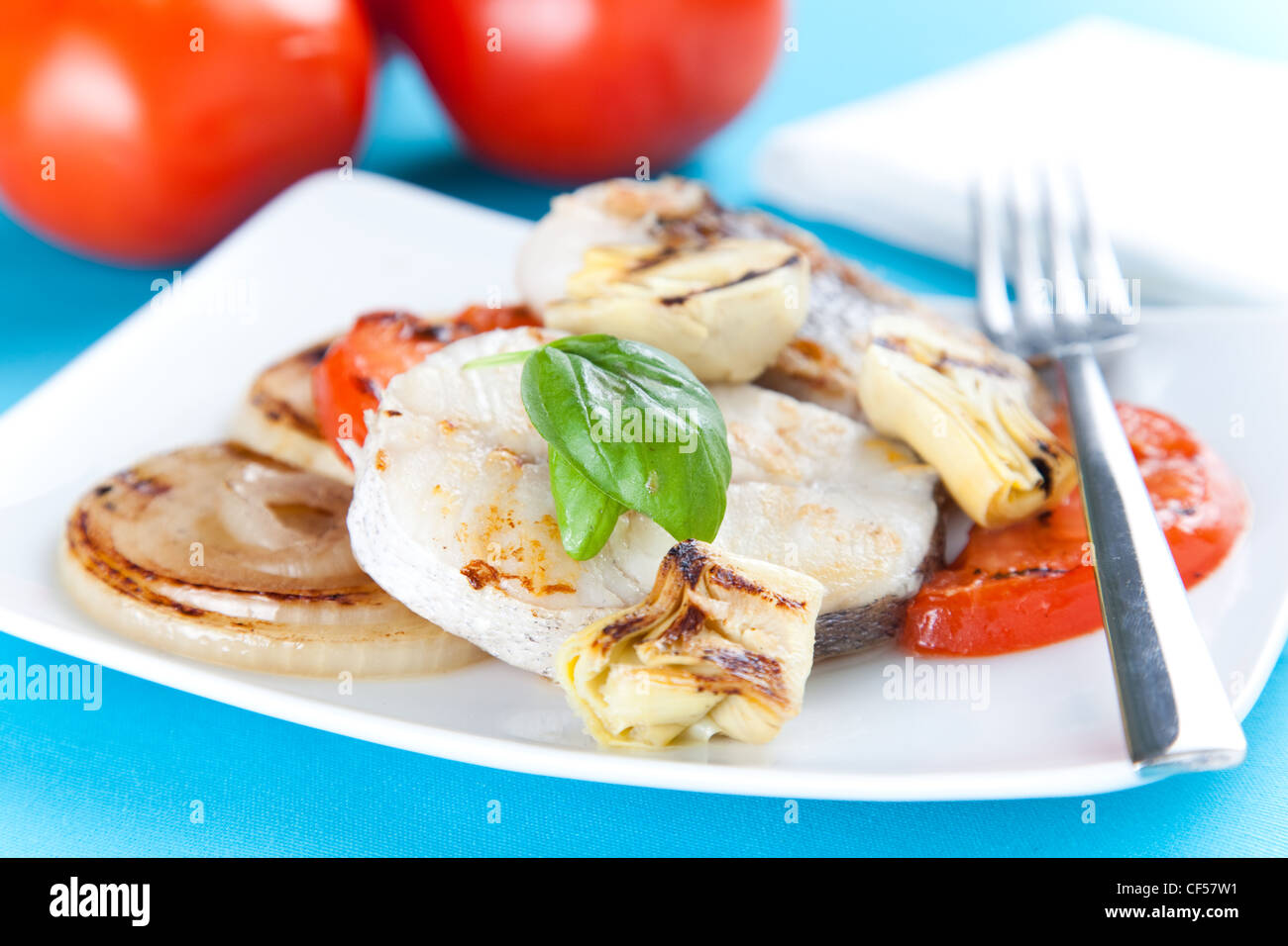 slice of hake grilled Stock Photo - Alamy