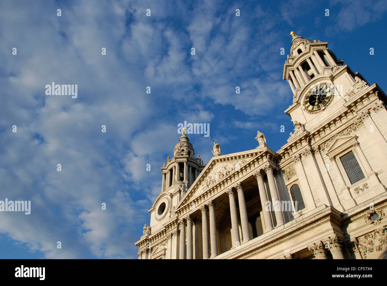 Western exterior of St Pauls Cathedral against a light blue sky. Stock Photo
