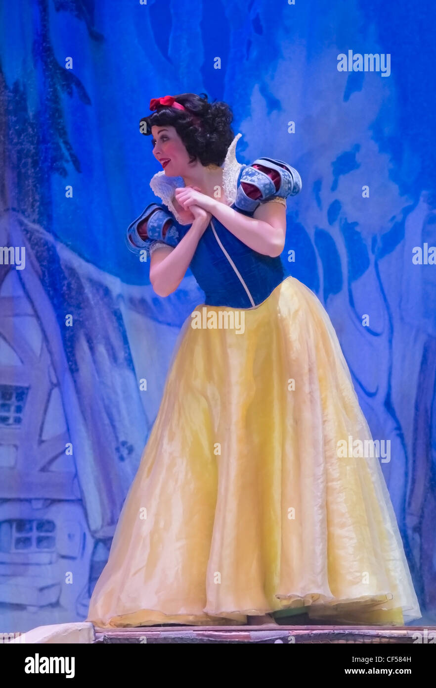 Snow White standing in a blue and yellow dress at the Disney Princesses show at the Resch Center in Green Bay Stock Photo