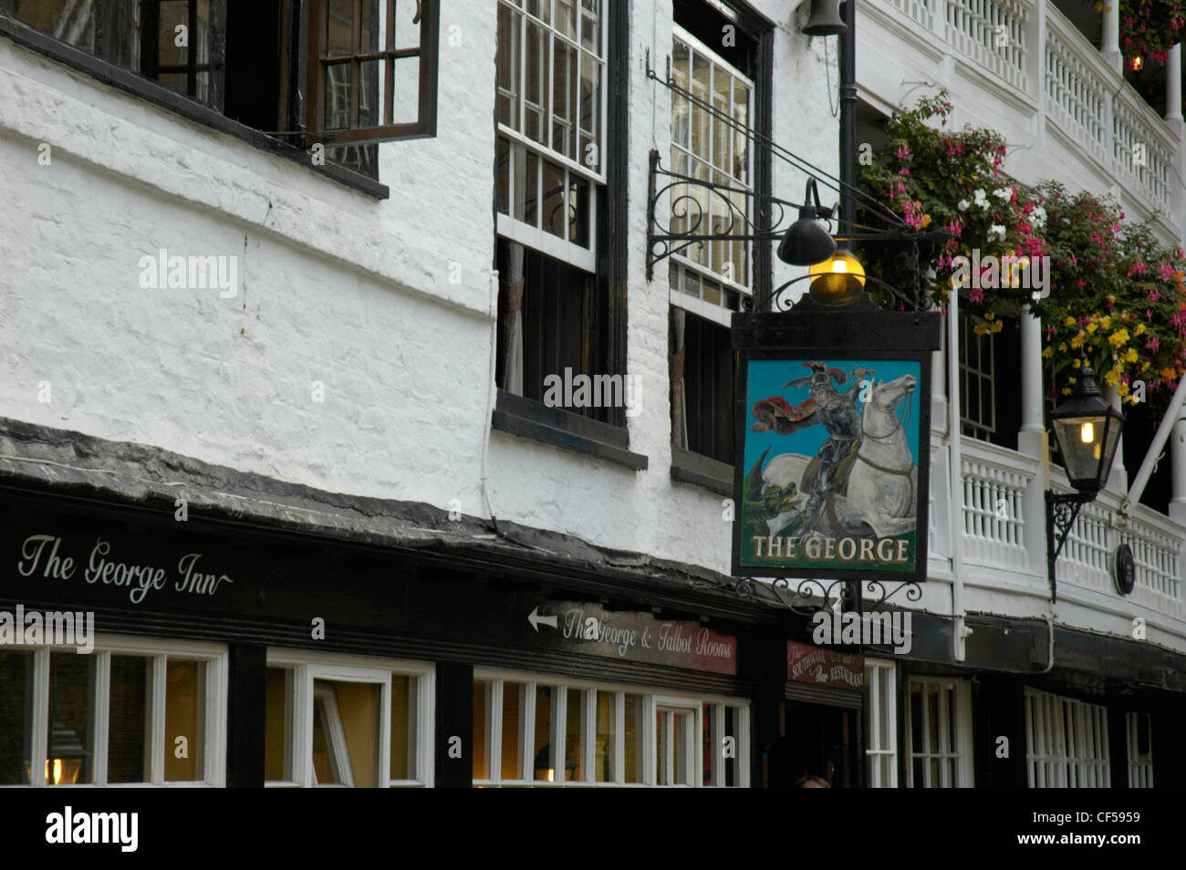 The timbered exterior of the 17th Century George pub on Borough High Street. Stock Photo