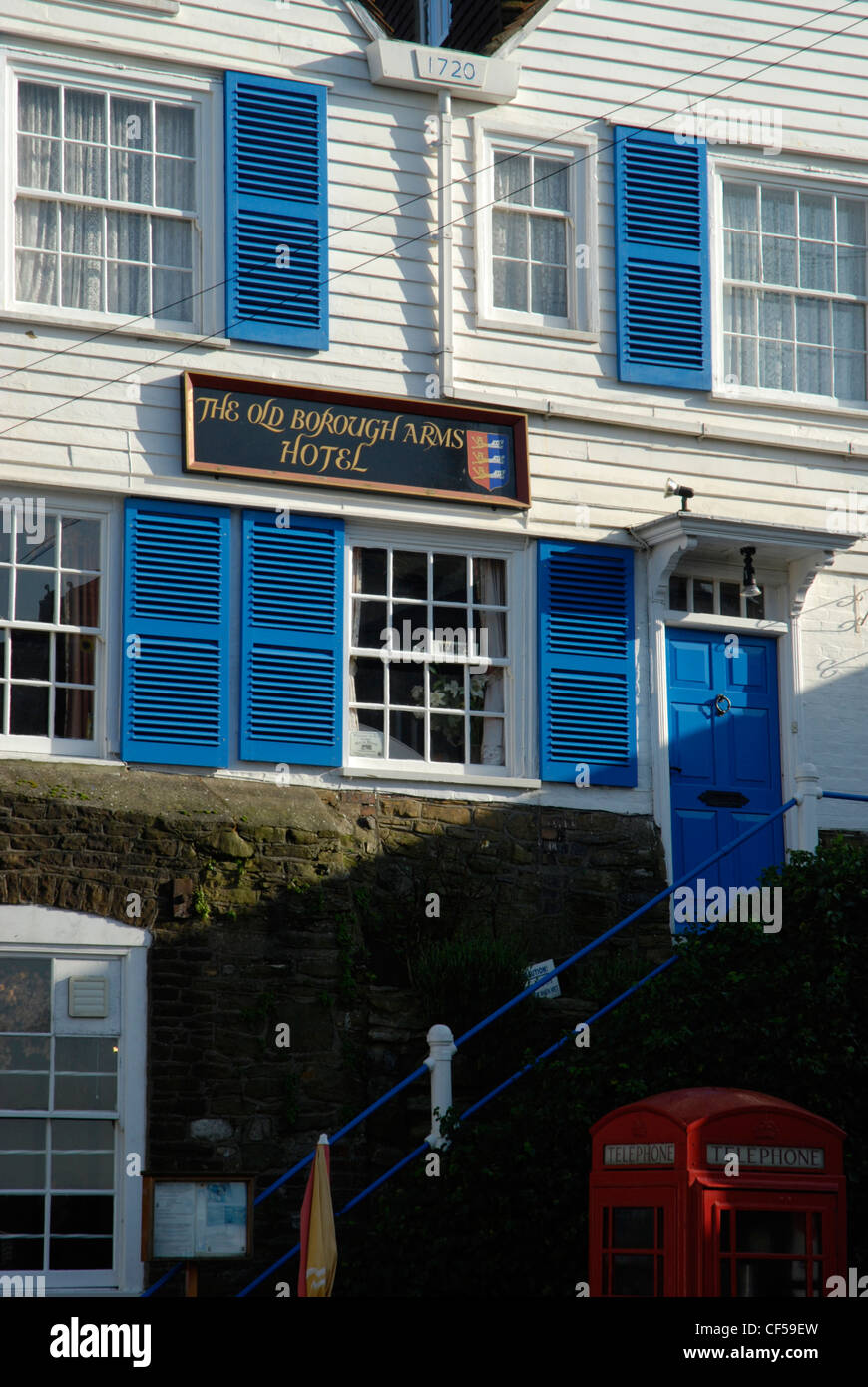 The white and blue wooden exterior of the Old Borough Arms Hotel in Rye. Stock Photo