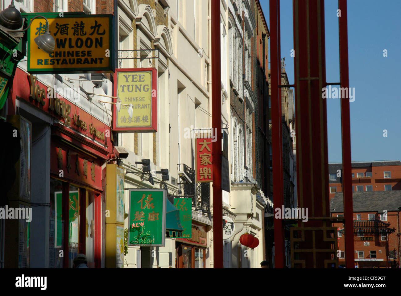 A row of signs outside chinese restaurants in Chinatown. Stock Photo