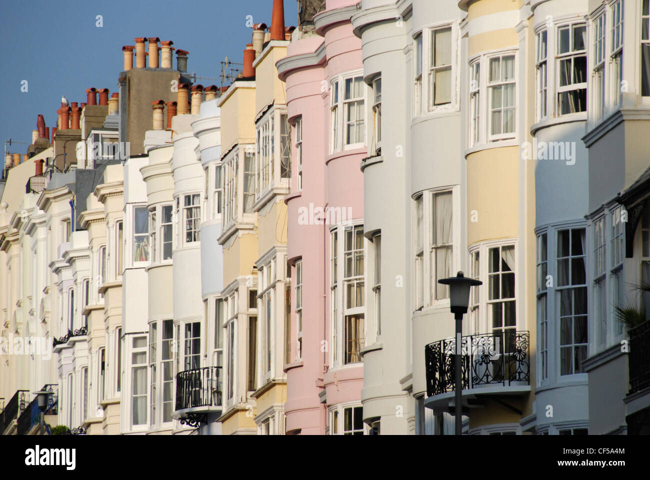 A row of colourful terraced houses in Brighton. Stock Photo