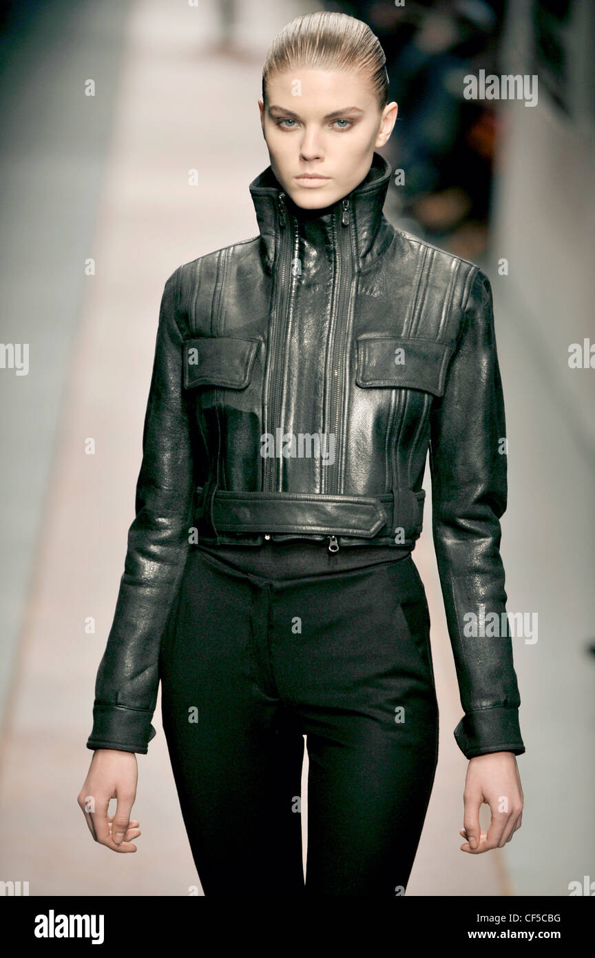 Belstaff Milan Ready to Wear Autumn Winter  Tied back hair, black leather cropped biker jacket and black high waisted pants Stock Photo
