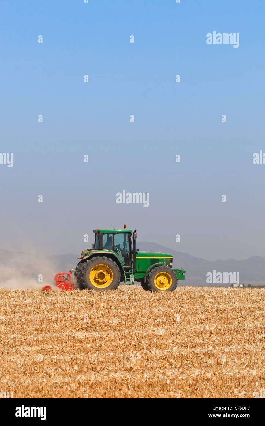 Tractor at work near Daimiel, Ciudad Real Province, Spain Stock Photo