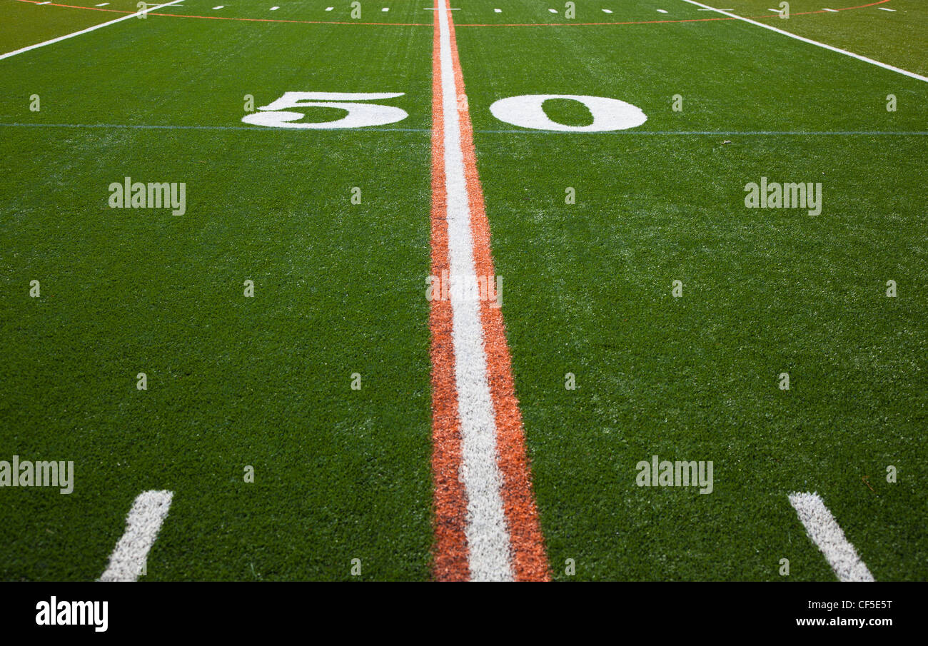 The 50 yard line of an American football field Stock Photo