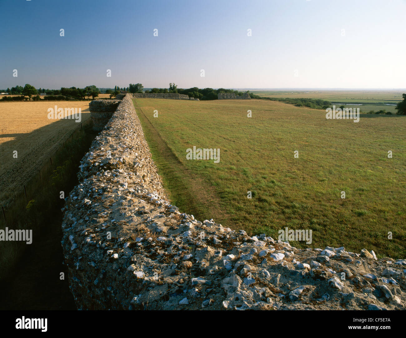Looking from the NE corner tower along the southern wall and projecting bastions of a rectangular fort built by the Romans in th Stock Photo
