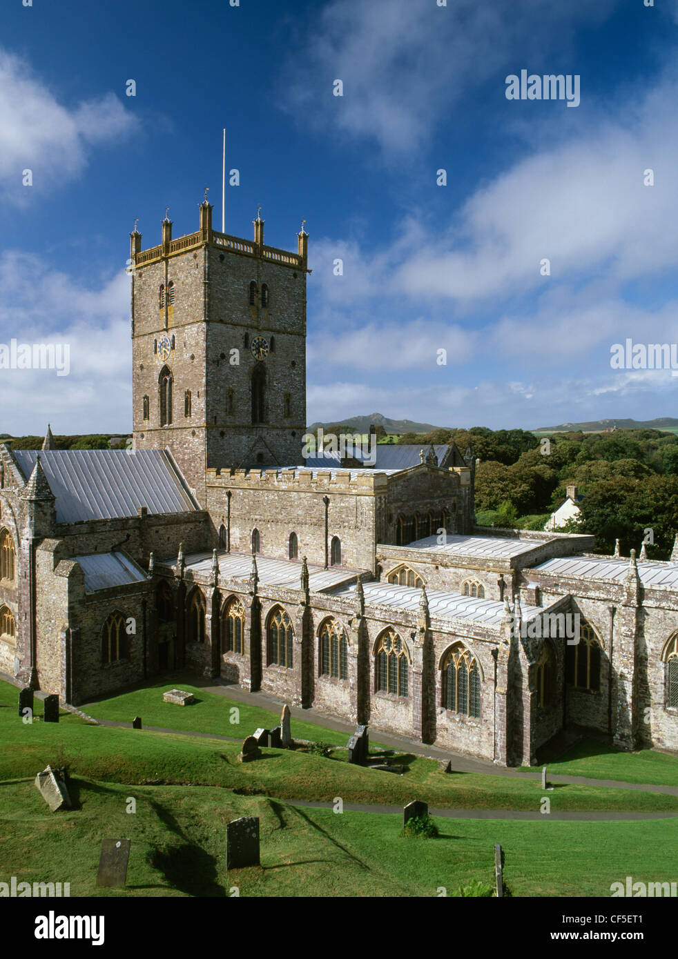 A general view of the exterior of St David's Cathedral looking NW towards the peak of Carn Llidi. Restored in 1863 by Sir G. G. Stock Photo