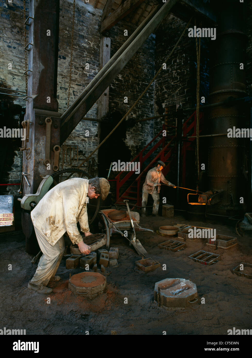A tableau of metal casting at the National Slate Museum housed within the Victorian (1870) workshops complex built by the Dinorw Stock Photo