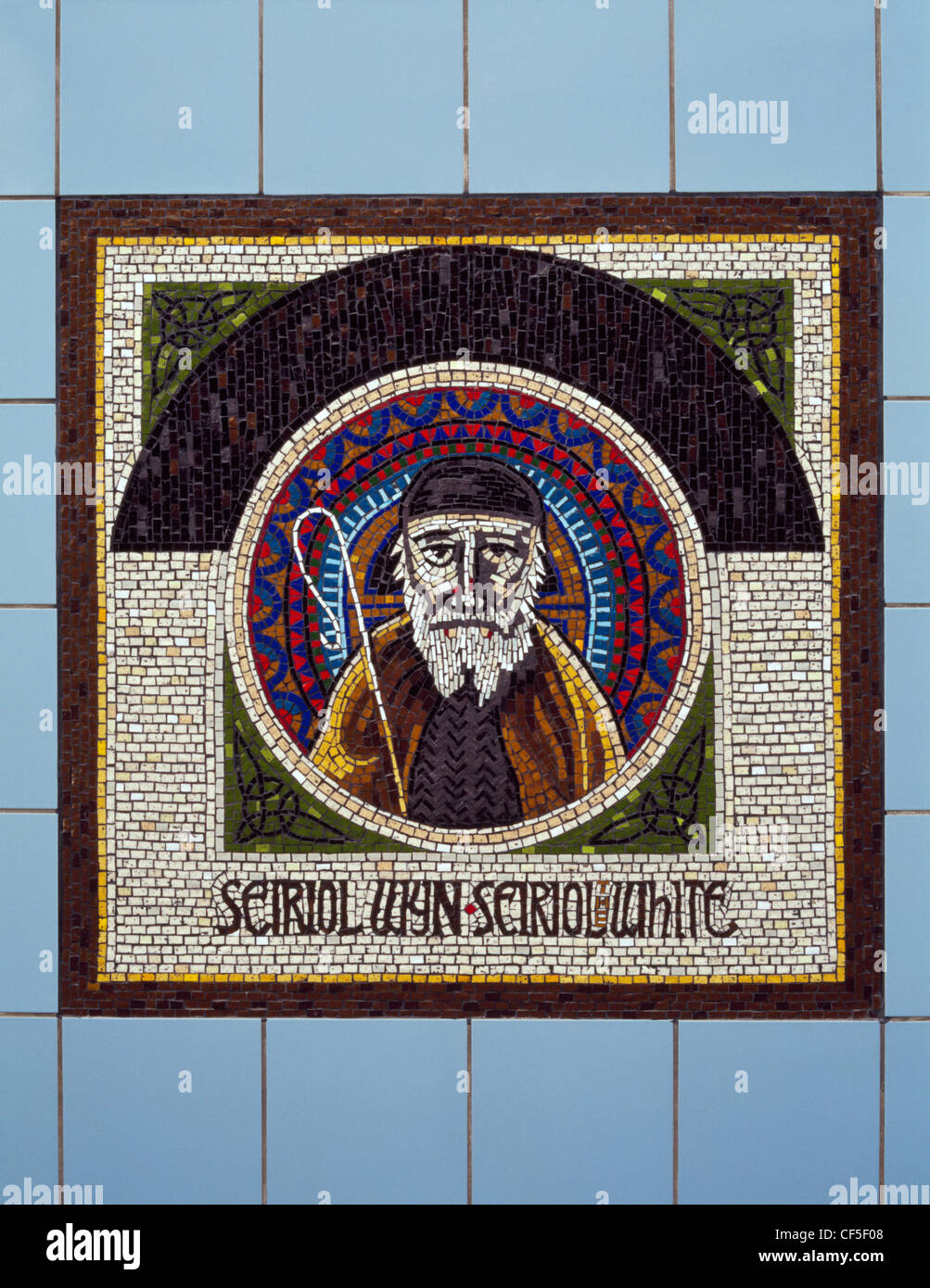 Mosaic of St Seiriol of Penmon, designed by Gary Drostle, at the Market Street entrance to the Celtic Gateway bridge which links Stock Photo