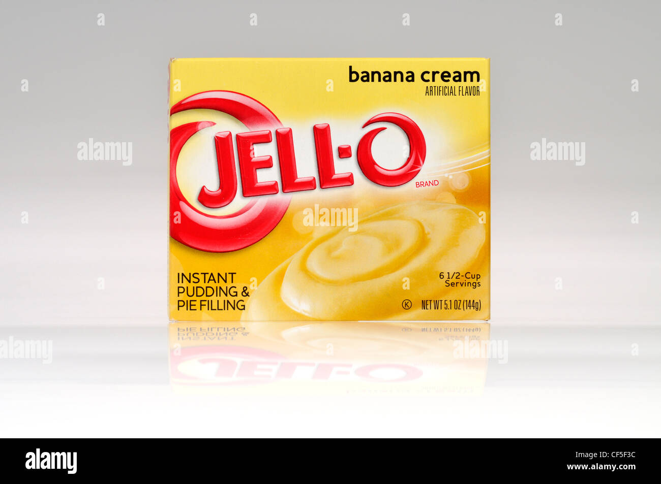 A package of jello instant pudding and pie filling banana cream flavor on white background cut out USA. Stock Photo