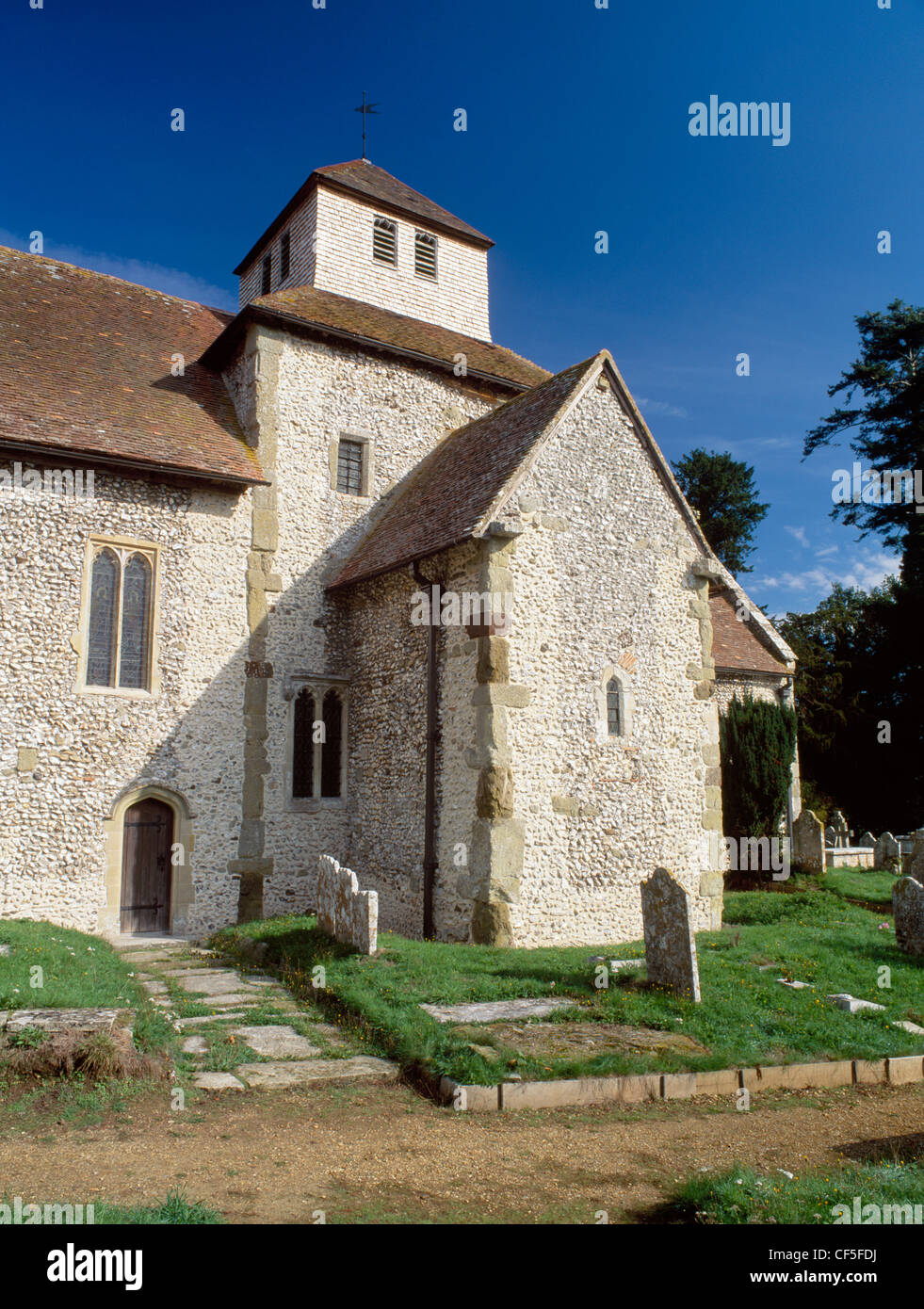 St Mary's is a good example of an English country church with features dating back to the 10th century: the megalithic pilaster Stock Photo