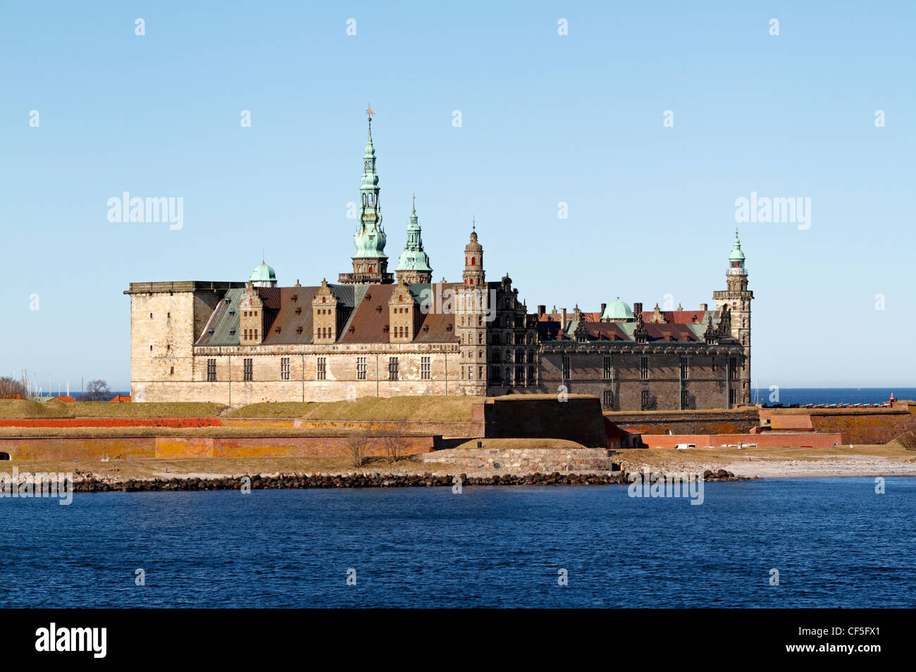 The Dutch renaissance castle Kronborg in Elsinore, Denmark, seen from the Oresund, the Sound, on a sunny spring day. Stock Photo