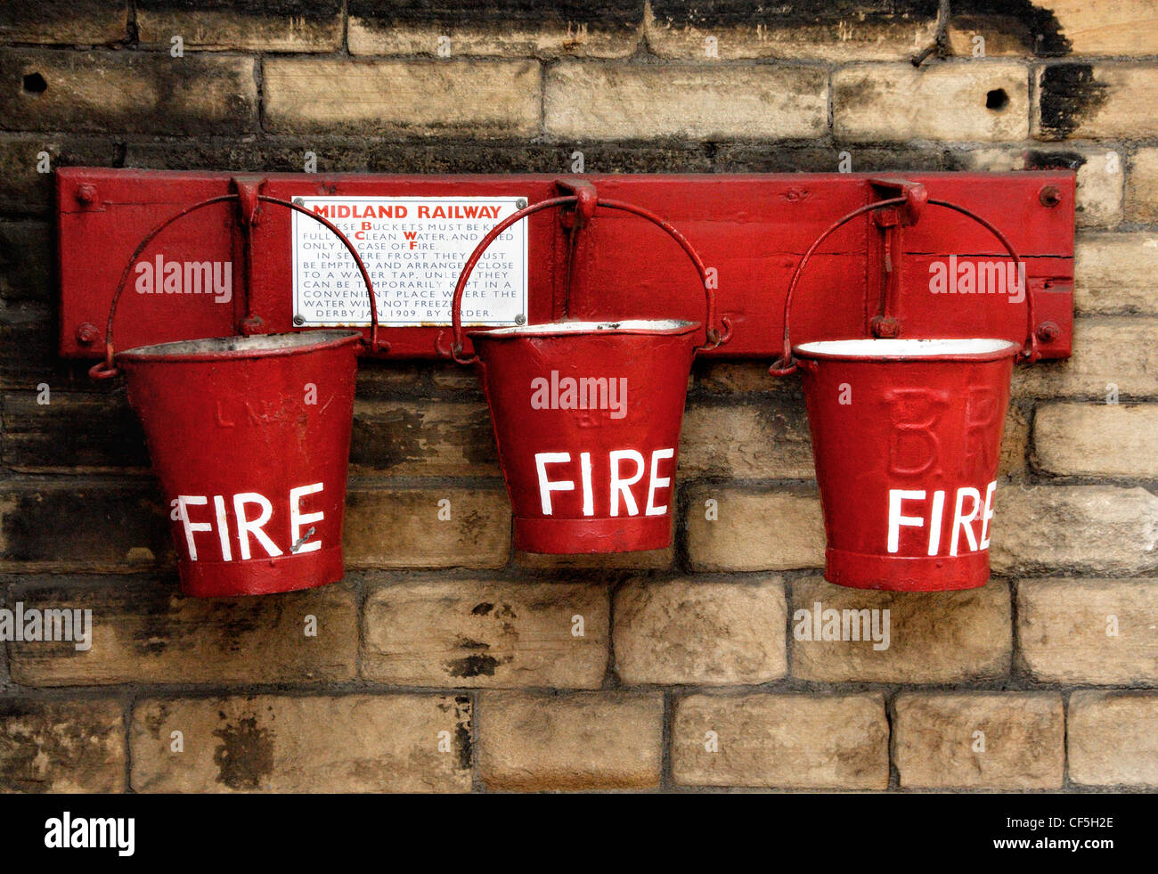 Old fire buckets at Keighley Station Stock Photo Alamy