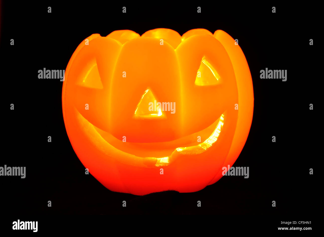 A close up of an illuminated pumpkin tea holder at a shop in Bankside. Stock Photo