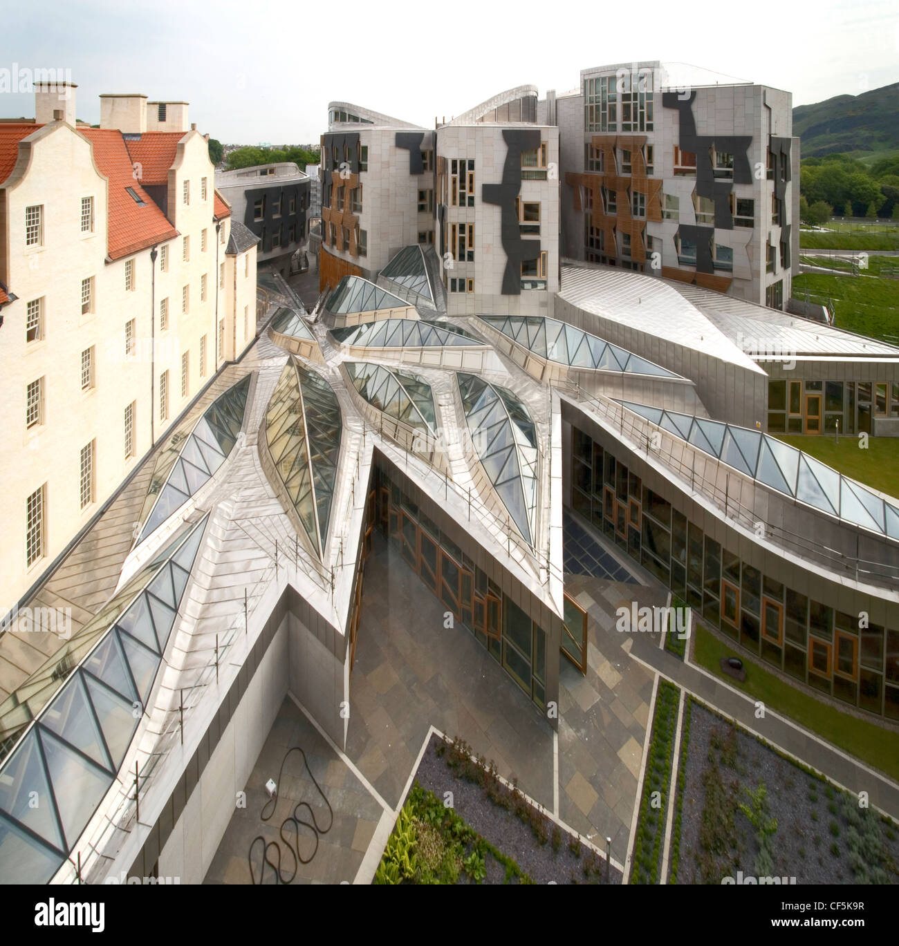 The Scottish Parliament building in Edinburgh. Constructed from a mixture of steel, oak, and granite, the complex building has b Stock Photo