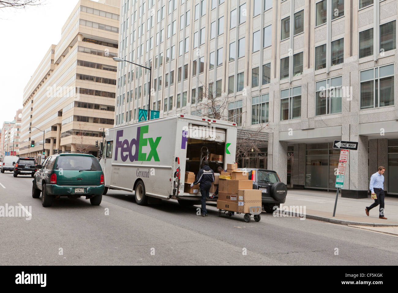 FedEx delivery man unloading truck - Washington, DC USA Stock Photo