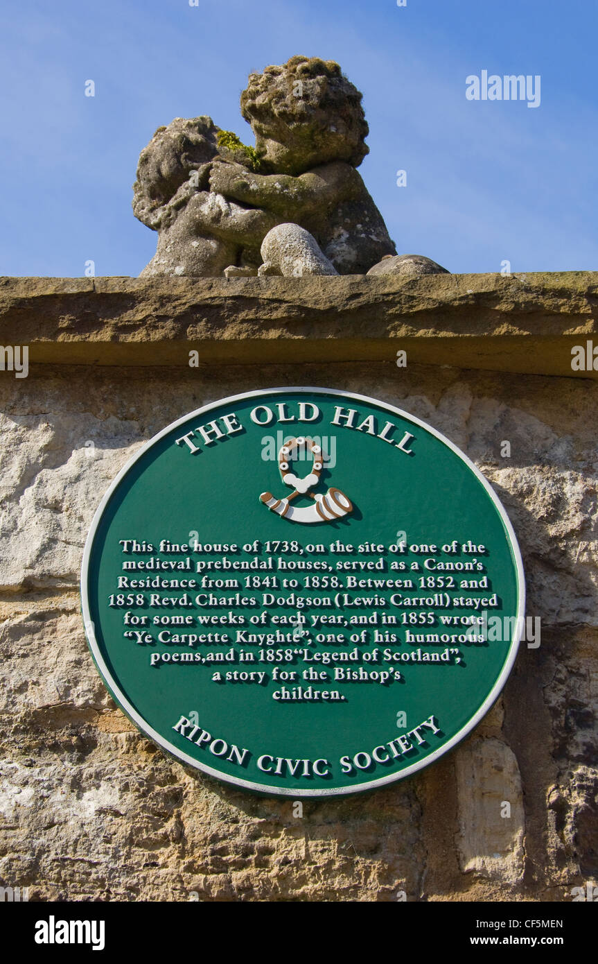 Plaque at the entrance to the Old Hall in Ripon where the Reverend Charles Dodgson (Lewis Carroll) stayed each year. Stock Photo