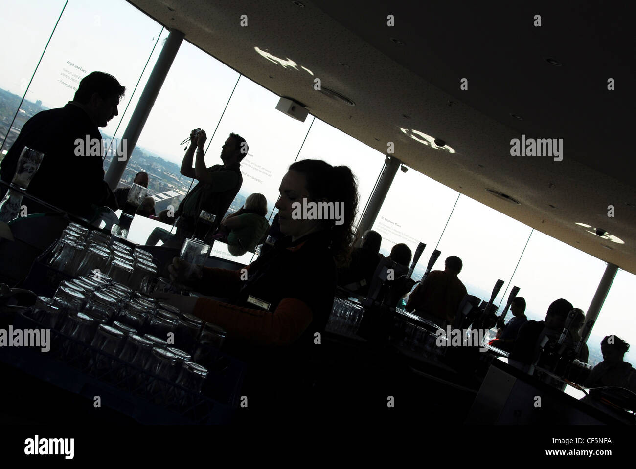 Visitors at the top floor bar at the Guinness Storehouse in Dublin. Stock Photo