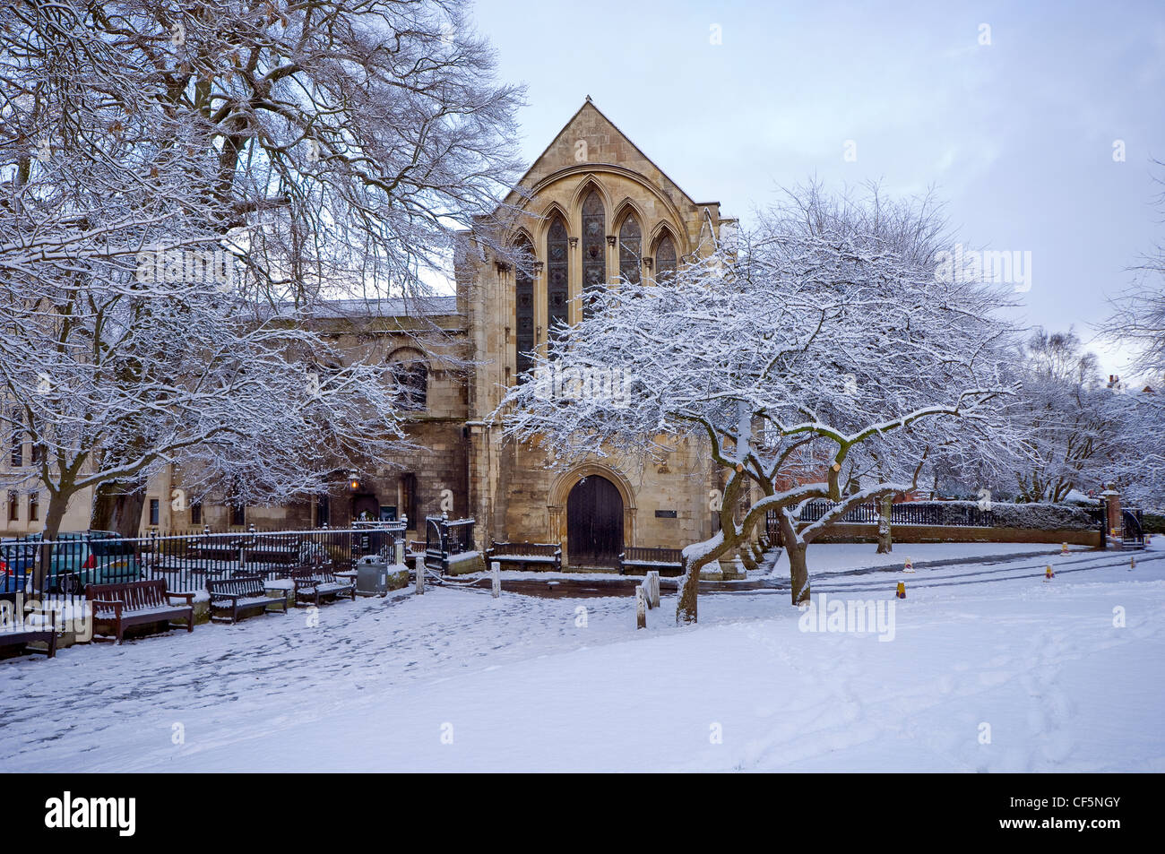 York Minster Library (1230), the largest cathedral library in England, viewed from the snow covered grounds of Deans Park. Stock Photo
