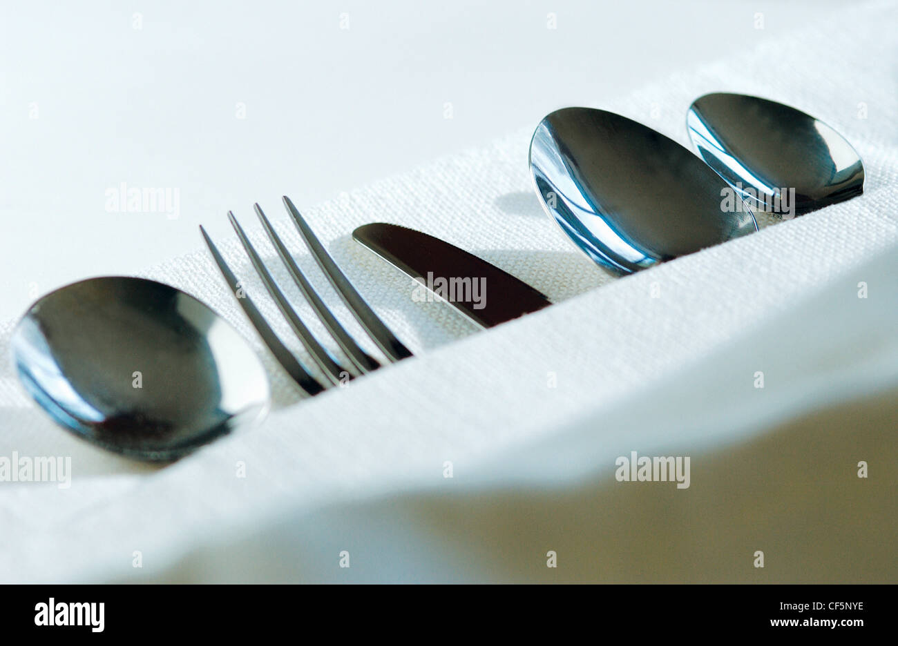 Close up of stainless steel cutlery. Stock Photo
