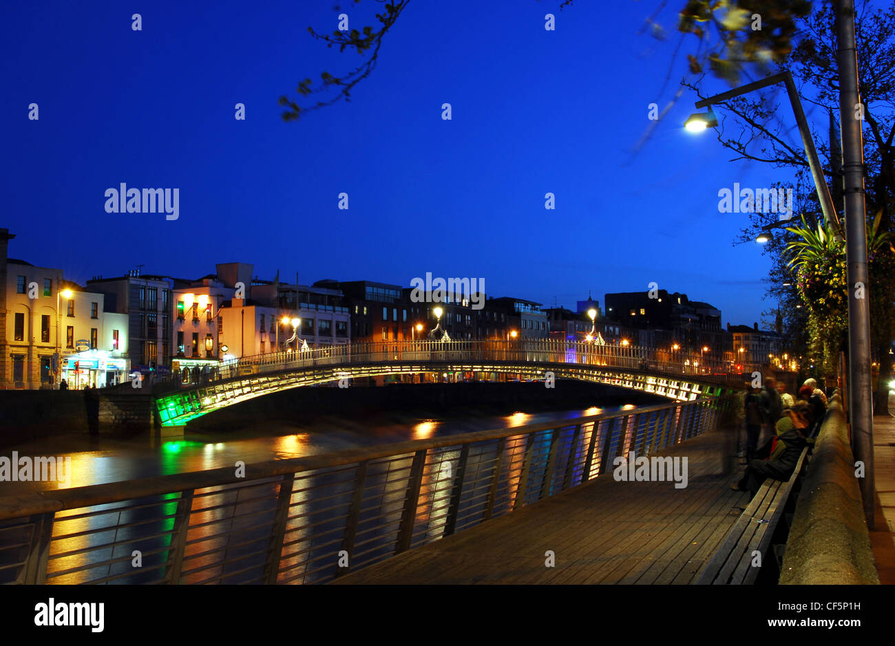 Illuminated buildings beside the River Liffey at dusk Stock Photo - Alamy