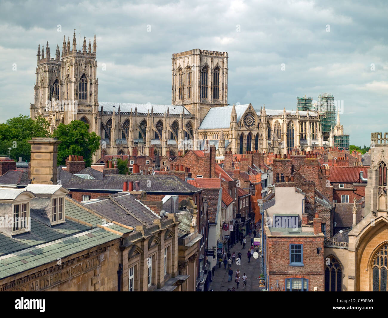 People shopping in Stonegate leading up to York Minster. Stock Photo