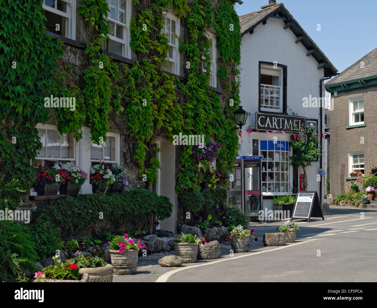Traditional house and the village shop in Devonshire Square. Stock Photo