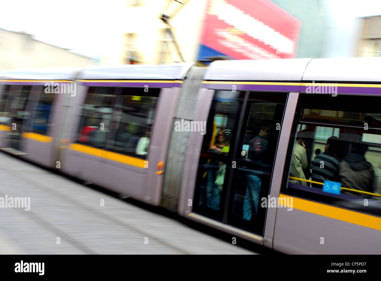 A view of a LUAS Tram in motion in central Dublin. Stock Photo