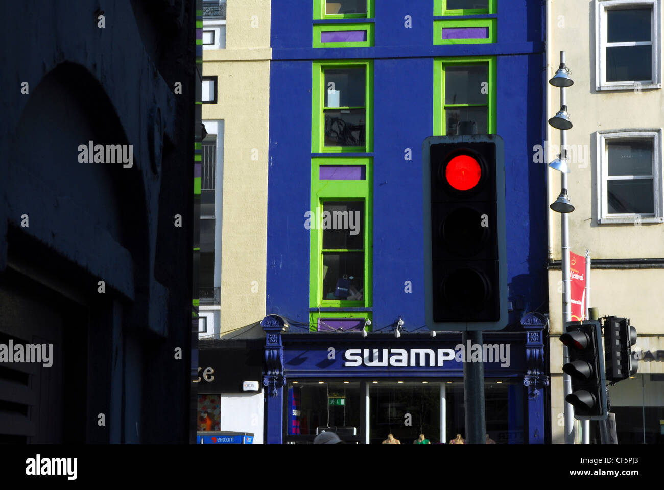 A traffic light turning red at a street scene in central Cork. Stock Photo