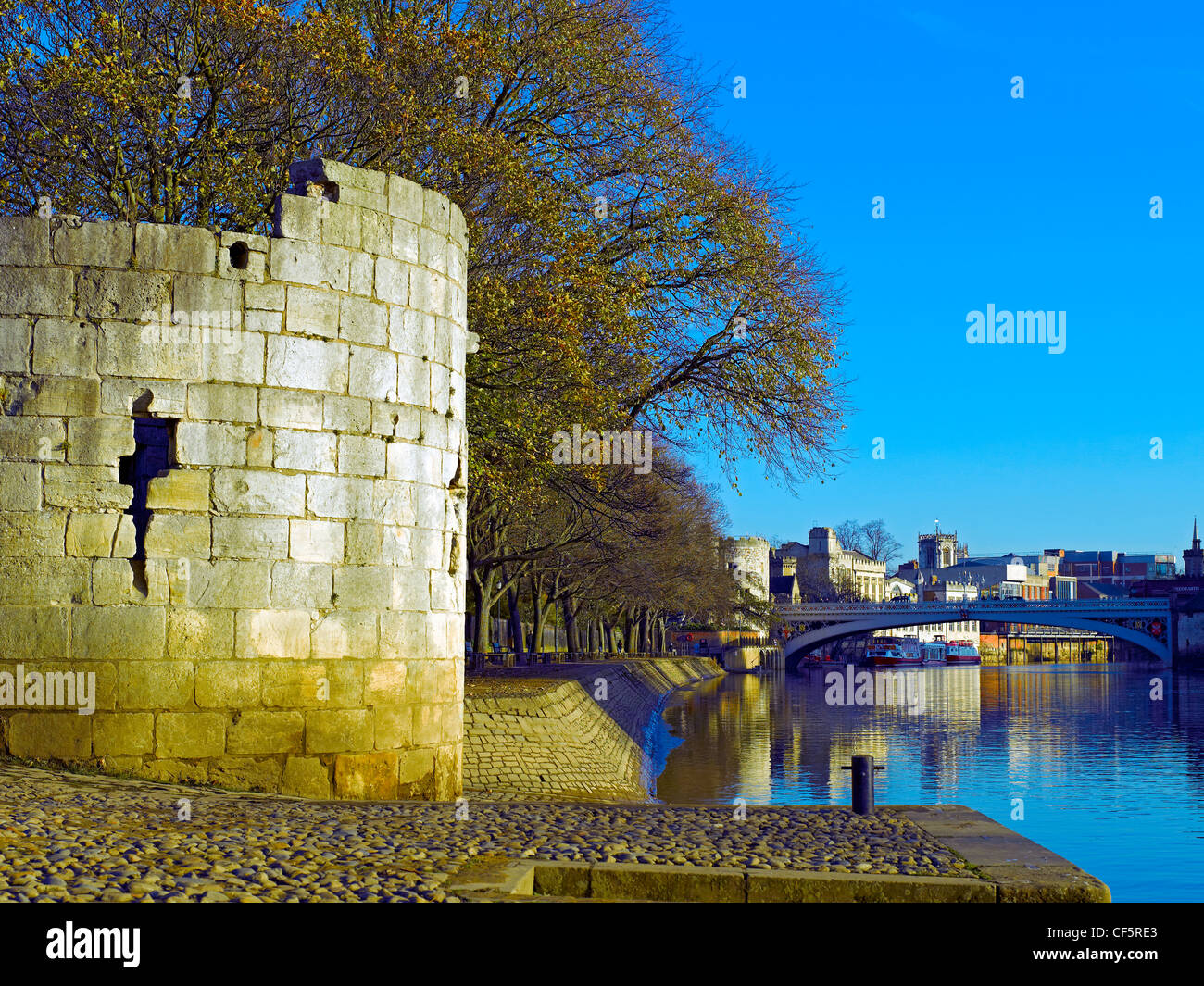 The remains of a tower, part of the Marygate walls on the North bank of the River Ouse. Stock Photo