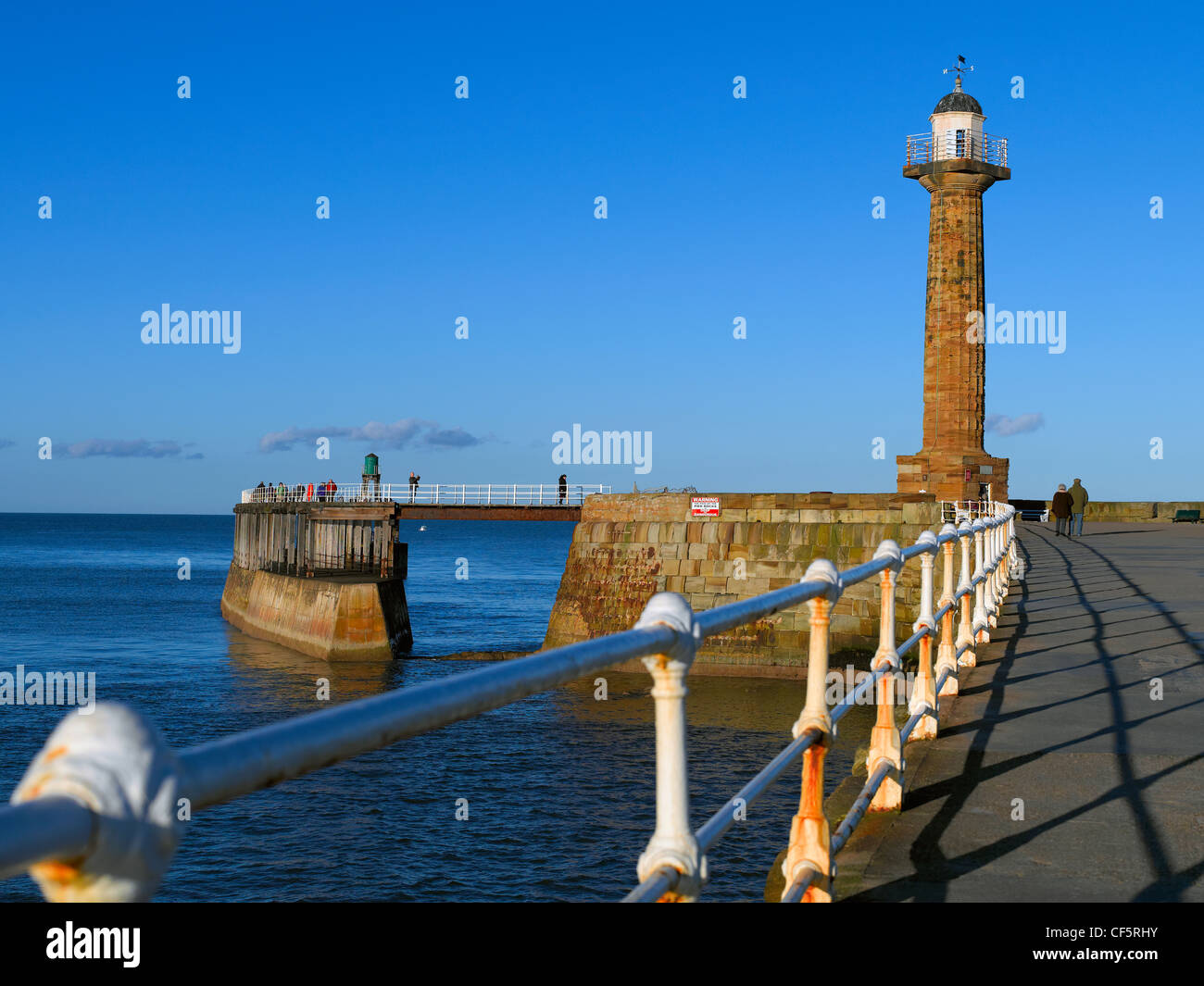 Whitby West Pier Light (Old) built in 1831 on the West Pier. The lighthouse was replaced by Whitby West Pier Light (New) at the Stock Photo
