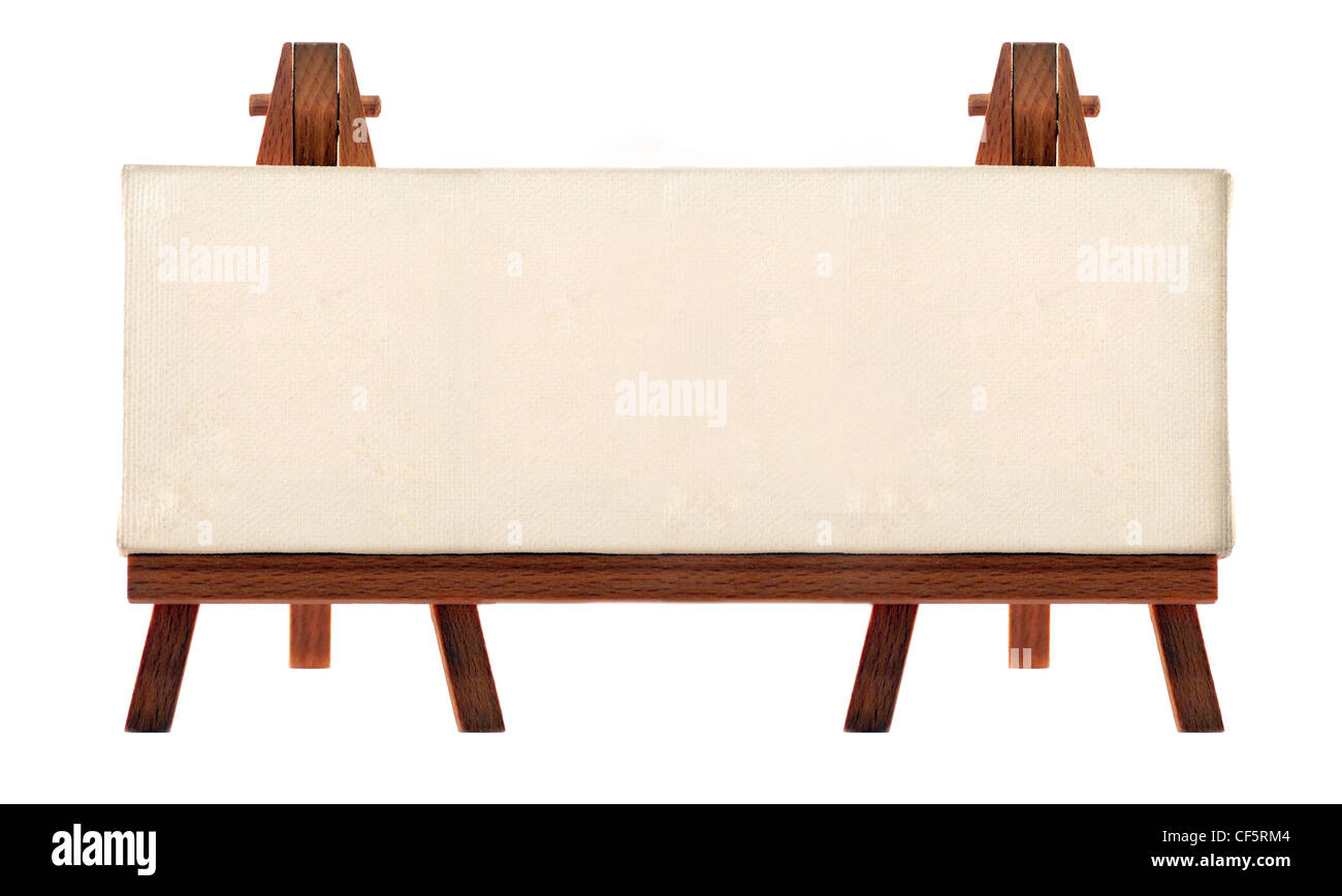 a customizable blank canvas on a wooden big tripod Stock Photo