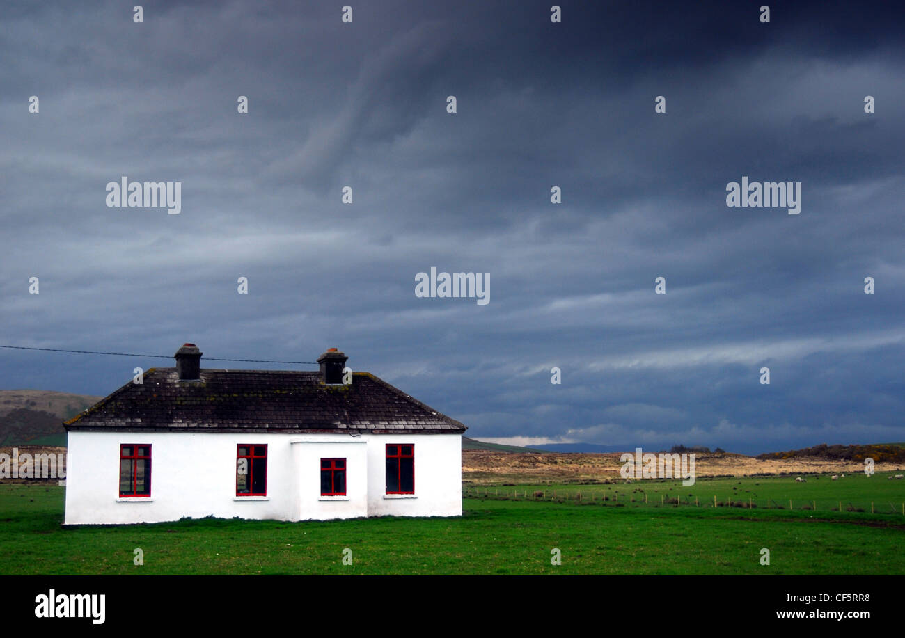 View toward a lone house near Doo Lough in County Mayo. Stock Photo