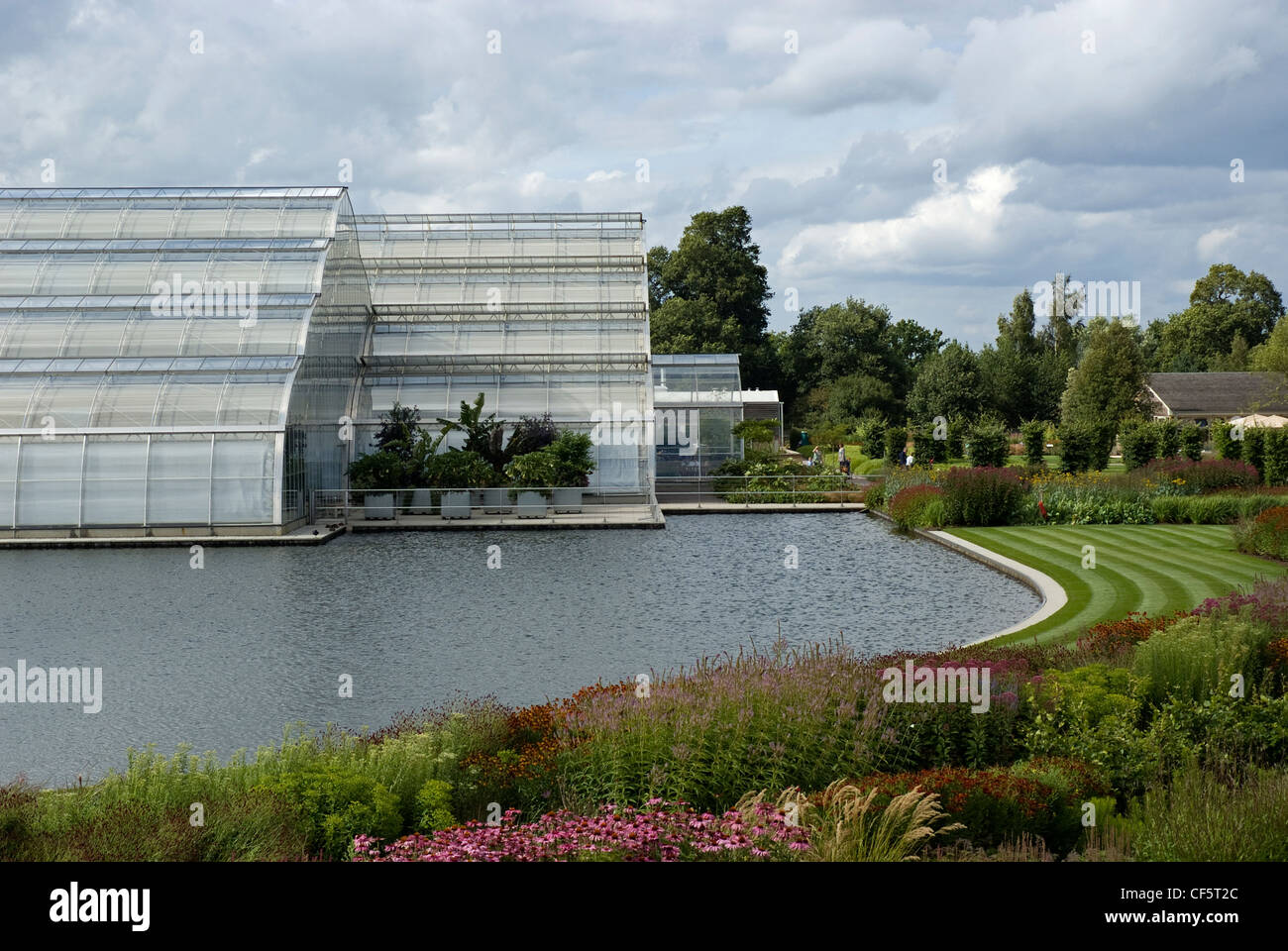 The new world-class glasshouse at RHS Wisley in redesigned landscaped surroundings by Tom Stuart-Smith. Stock Photo