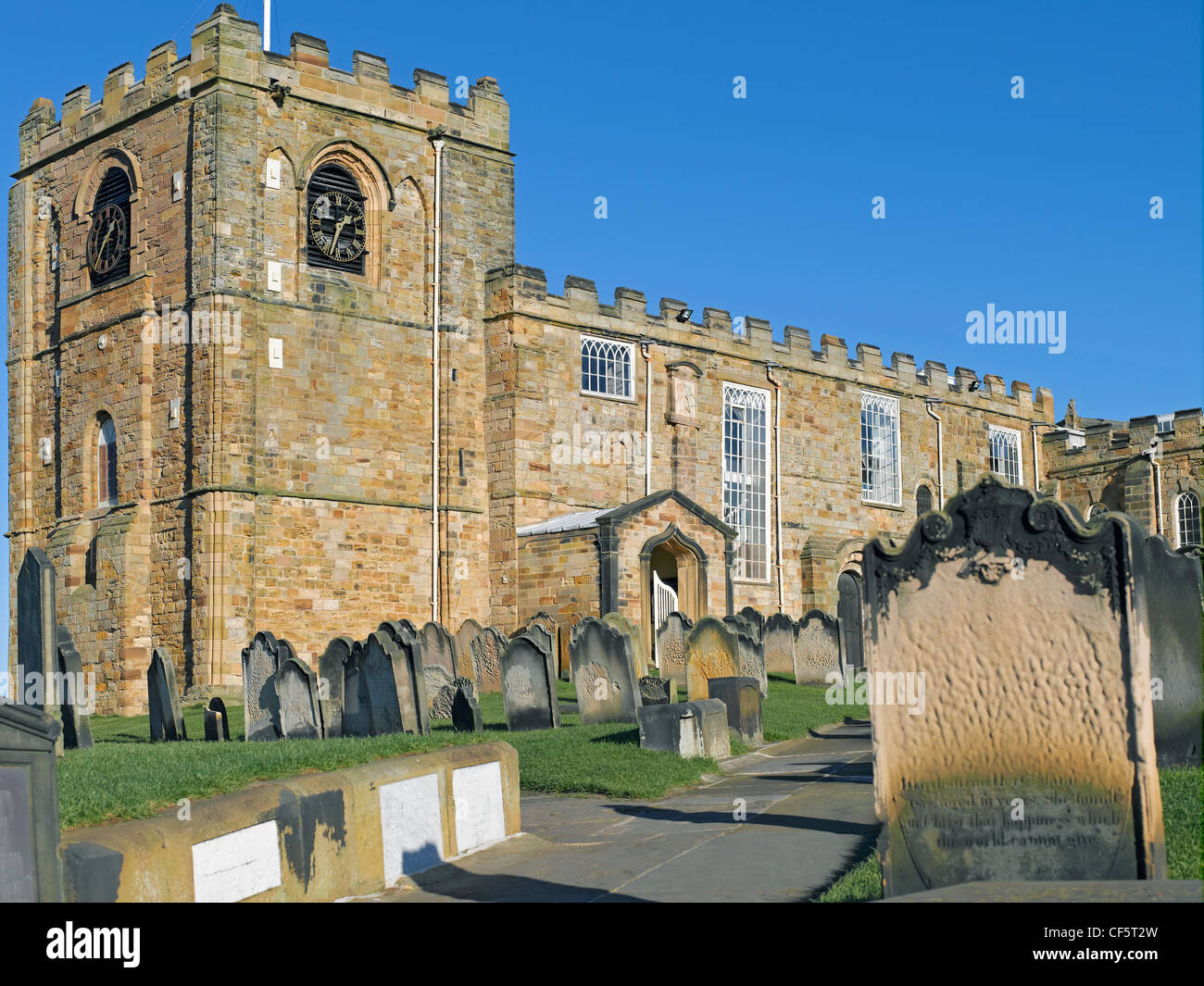St Mary's Church and graveyard on East Cliff above the old port of Whitby. Stock Photo