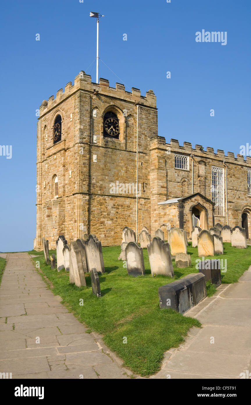 St Mary's Church and graveyard which originates from 1110. The church stands on the cliff top above Whitby town. Stock Photo