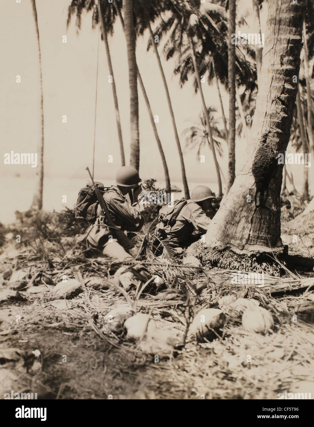Marine Corps machine gunners observing any enemy activity March 10 1944 Pacific Campaign WWII Guadalcanal Island Stock Photo
