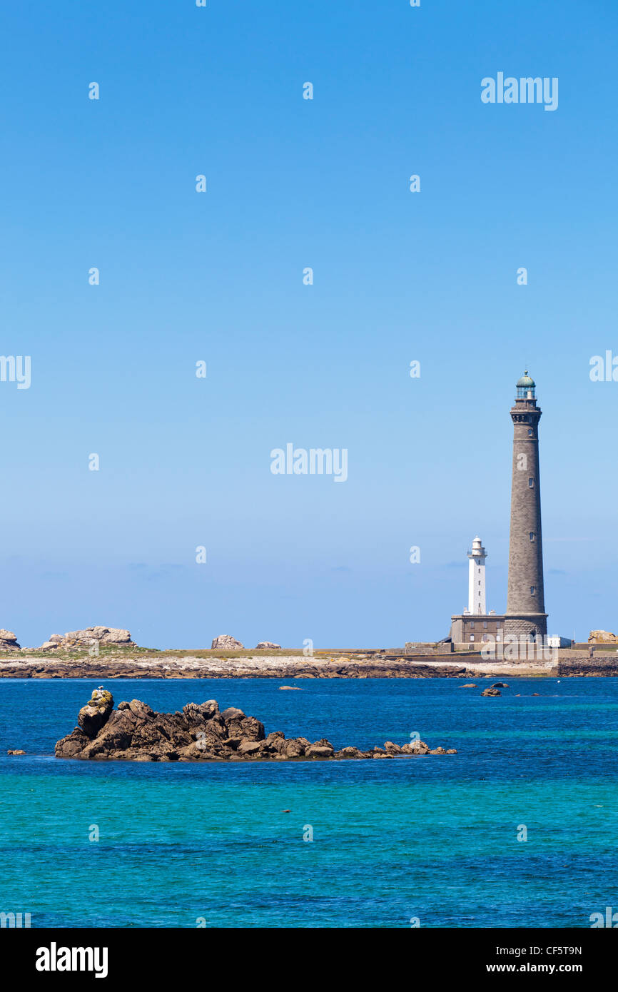 The lighthouse at Ile Vierge on a sunny summer day, on the north coast of Finistere, Brittany, France Stock Photo