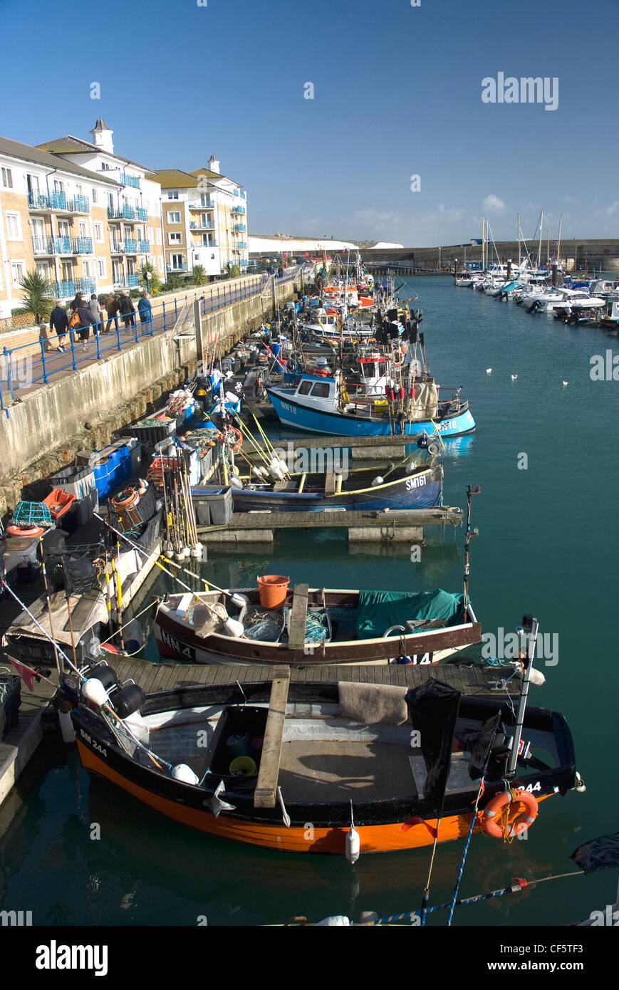 Small fishing boats moored in Brighton Marina. Stock Photo