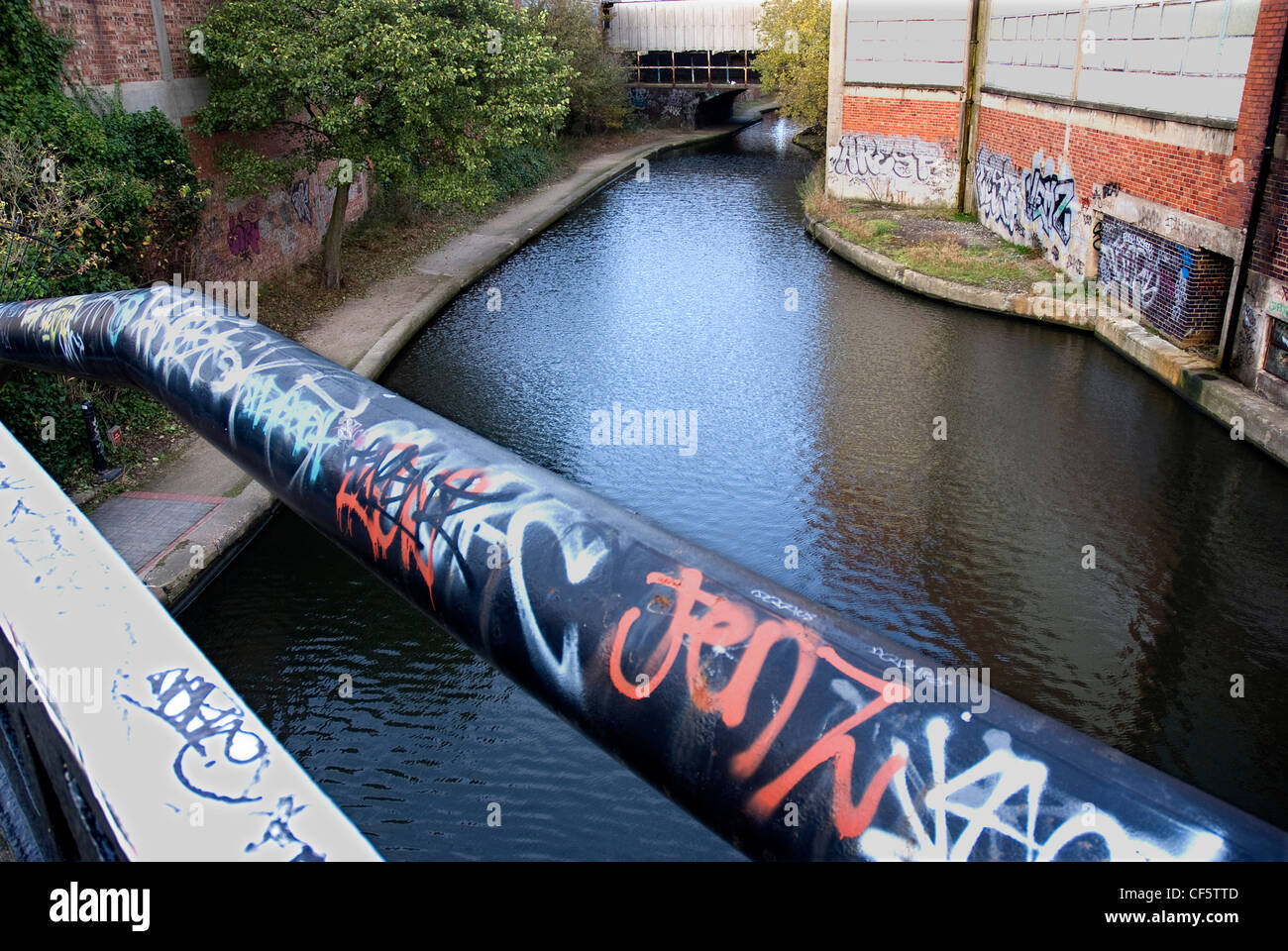 Grafitti adding colour to the Bordersley Junction canal in Birmingham. Stock Photo