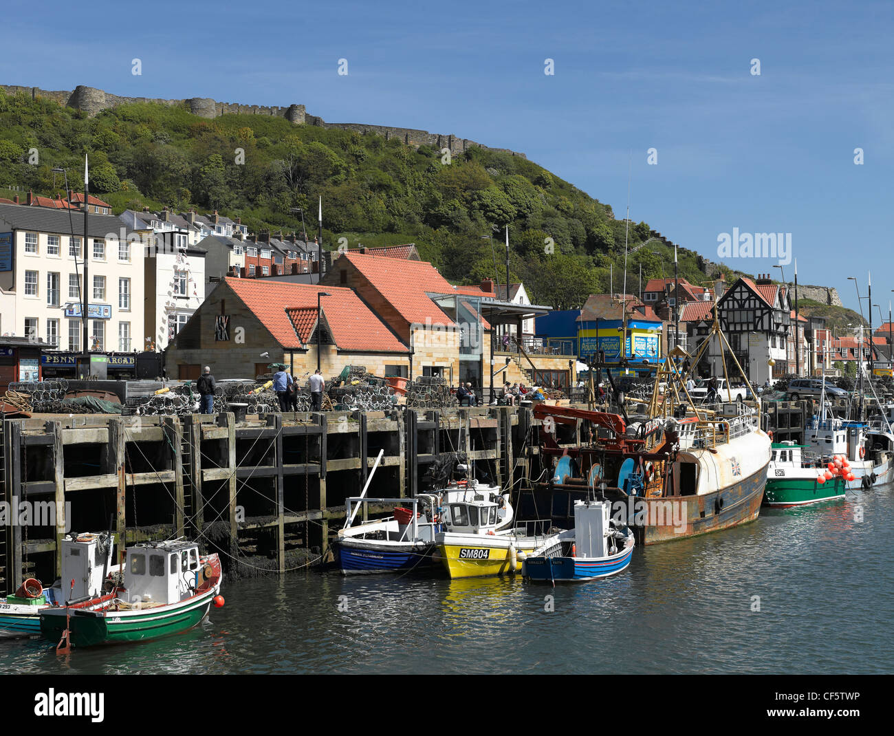 Fishing boats moored in Scarborough harbour. Stock Photo
