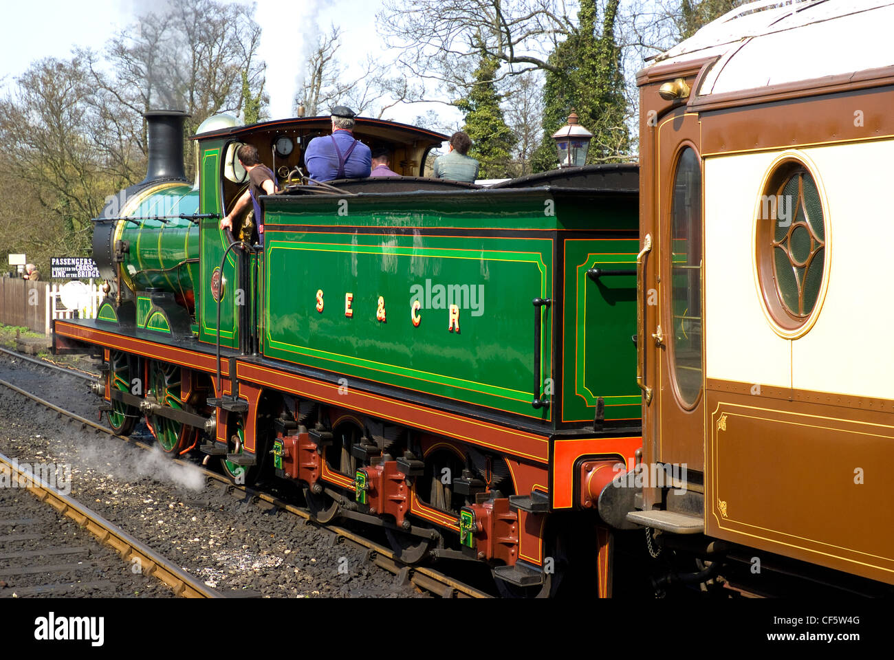 A steam train pulling out of Sheffield Park Station on the Bluebell Railway. Stock Photo
