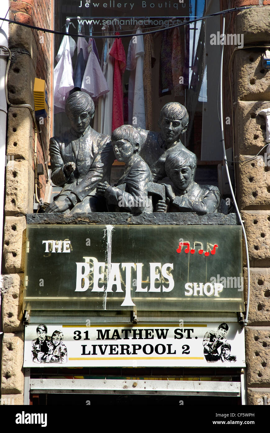 Statues over the entrance to The Beatles Shop on Mathew Street. Stock Photo
