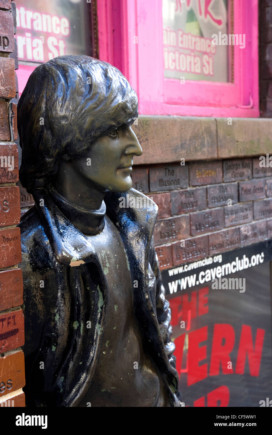 Statue of John Lennon outside the Cavern Club, the venue where Brian Epstein first saw The Beatles performing in 1961. Stock Photo