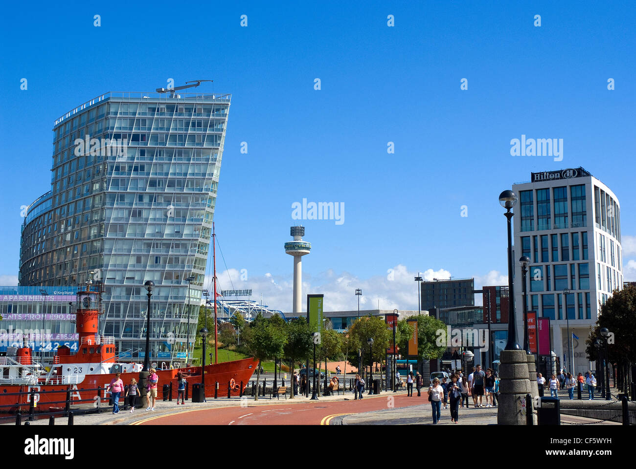 A mixture of old and new landmarks in Liverpool featuring the former Mersey Bar Lightship 'Planet' in Canning Dock, One Park Wes Stock Photo