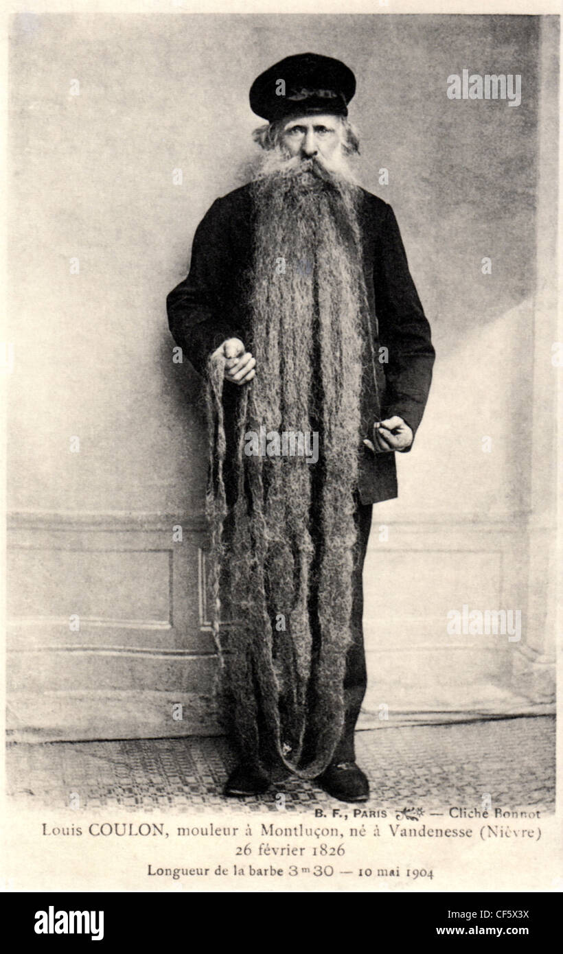 Archival photograph of Louis Coulon and his 11 foot long beard, circa 1904, Paris, France. Stock Photo