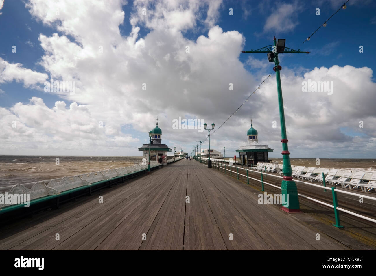 Perspective view along the length of a pier at Blackpool. The town is believed to get its name from a drainage channel which ran Stock Photo