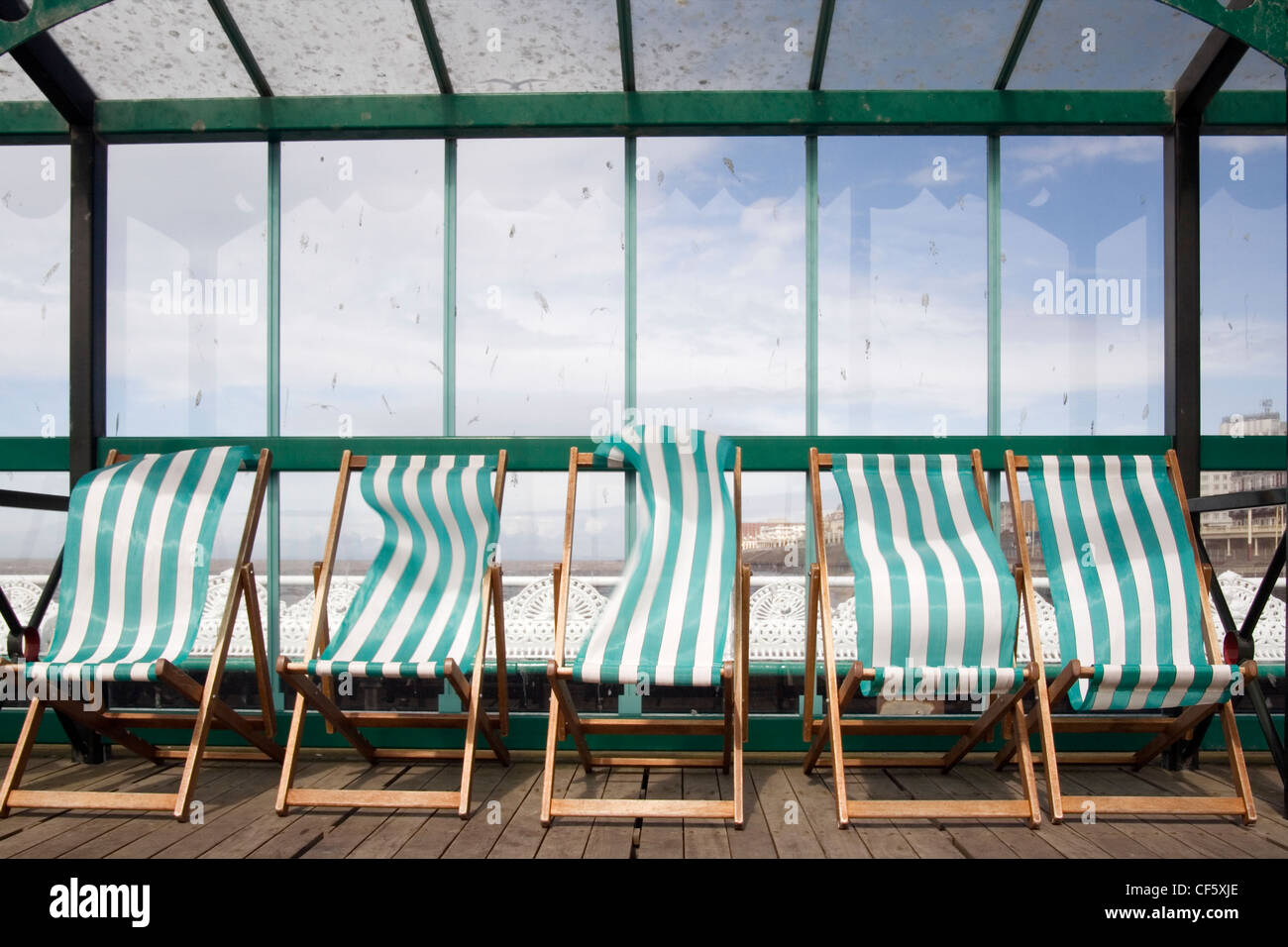 Empty striped deck chairs on the North Pier at Blackpool Stock Photo