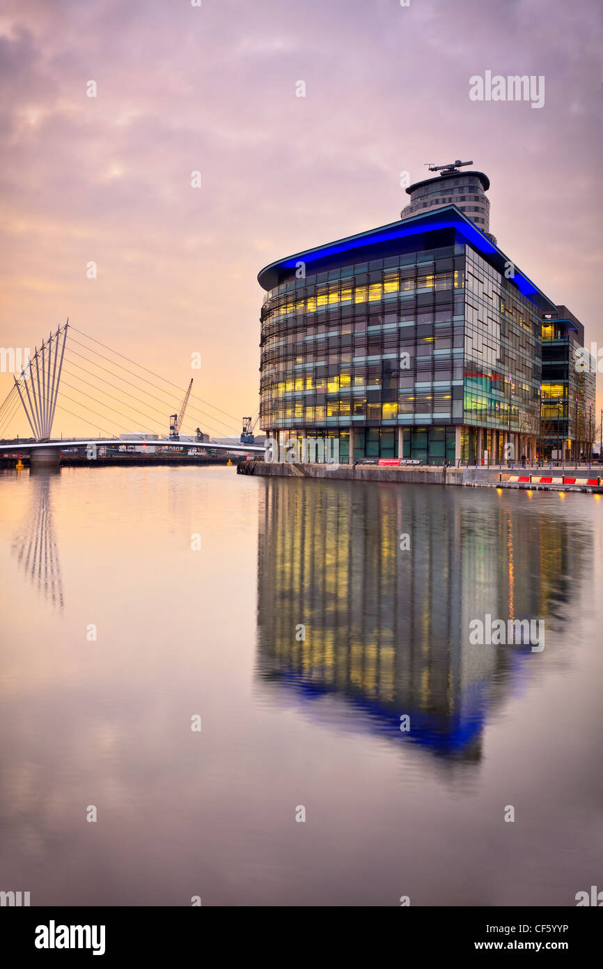 View across Salford Quays to the new MediaCityUK development on Pier 9. The BBC are due to complete the move of five departments Stock Photo